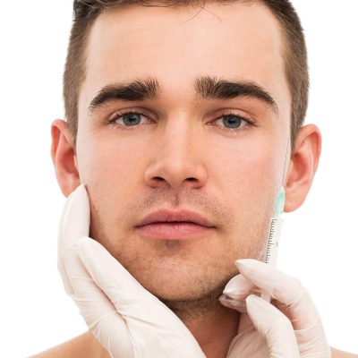 Plastic surgery. Handsome man on a white background